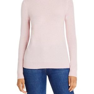 100% Cashmere light pink women’s Bloomingdale’s sweater size small.